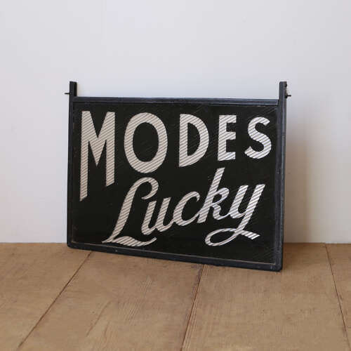 'Modes Lucky’ Retail Sign
